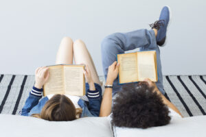 Young people reading book