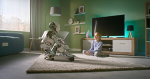 Zoom in view of girl sitting on carpet near TV set and talking with android while resting at home in weekend